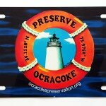 Aluminum vanity tags for the fron of your automobile (certain states) with OPS logo and blue lagoon background. Made in Ocracoke
