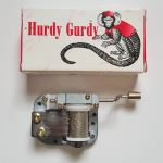 Hurdy Gurdy, miniature music boxes.